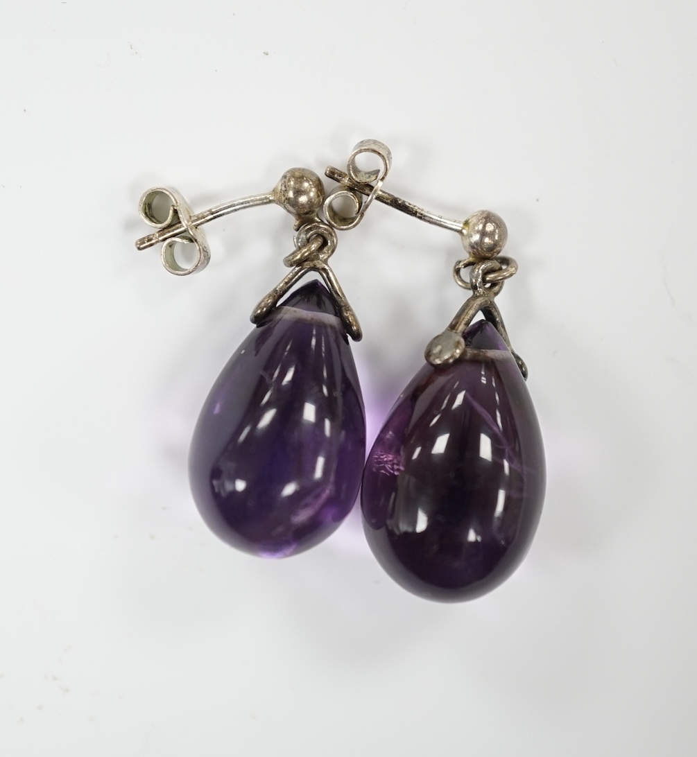 A pair of white metal and pear shaped amethyst drop earrings, 18mm.